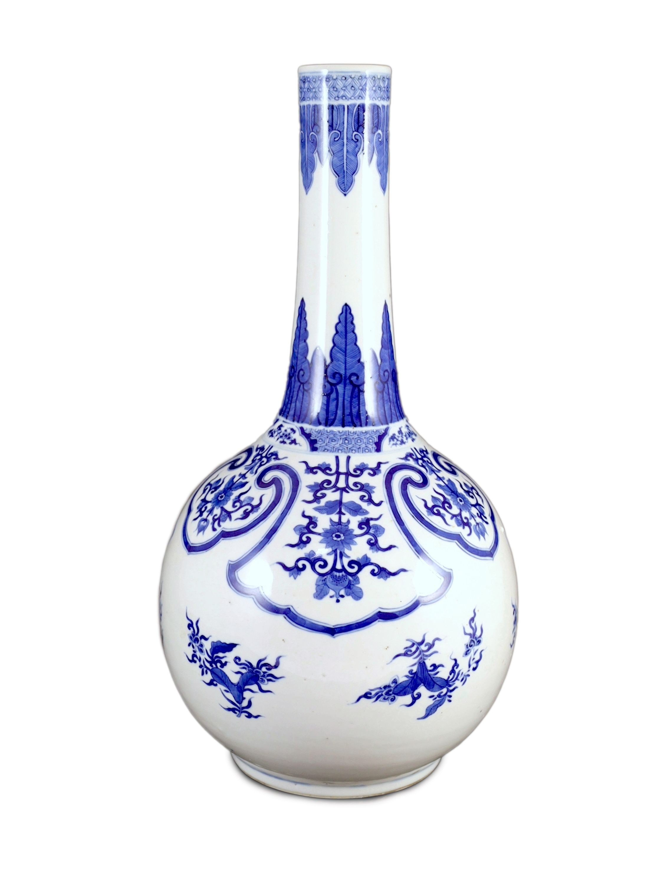 A large Chinese blue and white bottle vase, 19th century, 46cm high, wood stand, drilled hole to vase